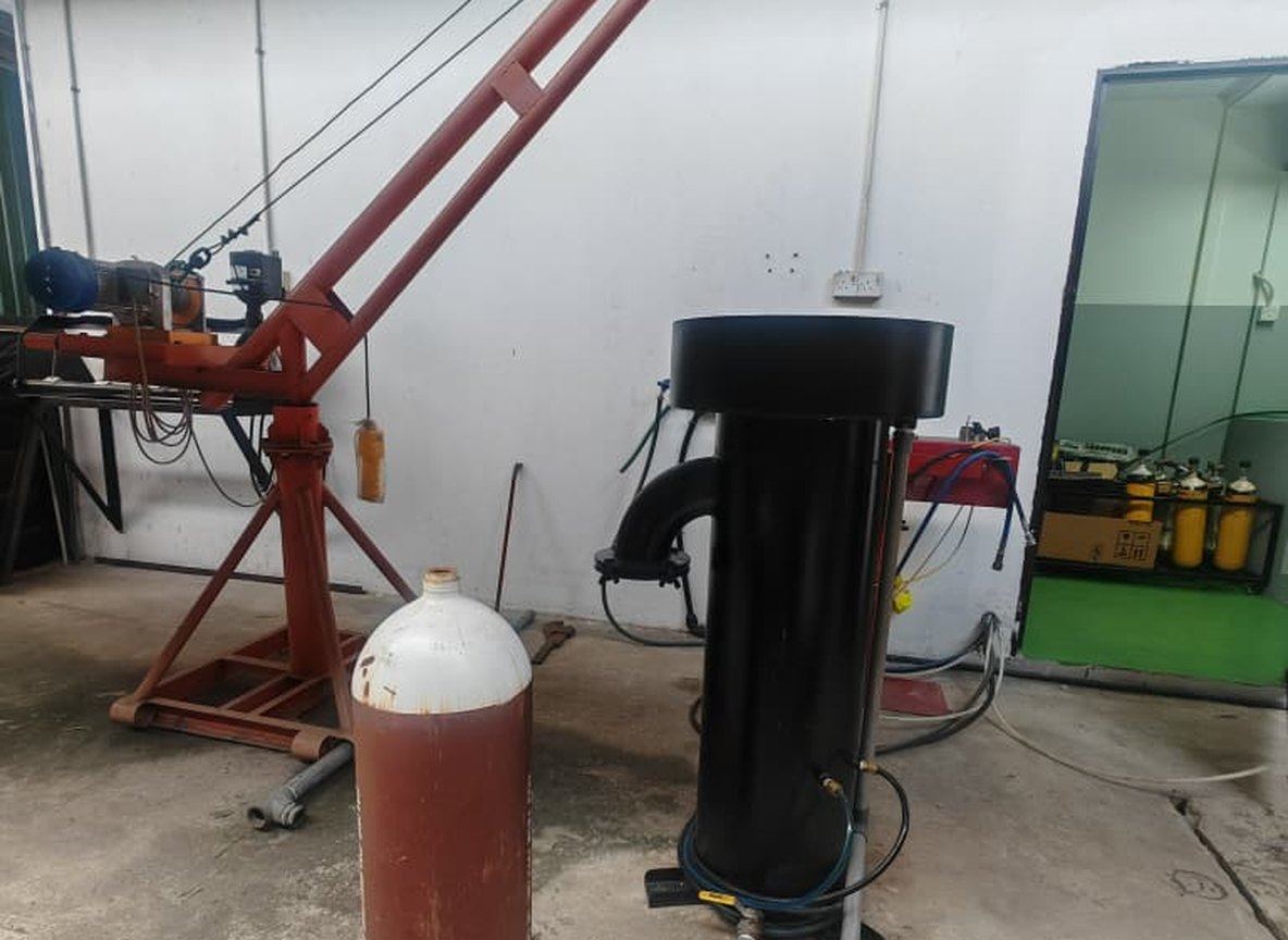 Breathing air cylinders on a pallet in the workshop
